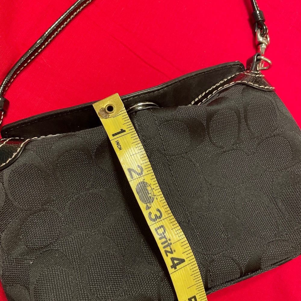 Coach small purse. Black. See pic for measurements. Very clean.